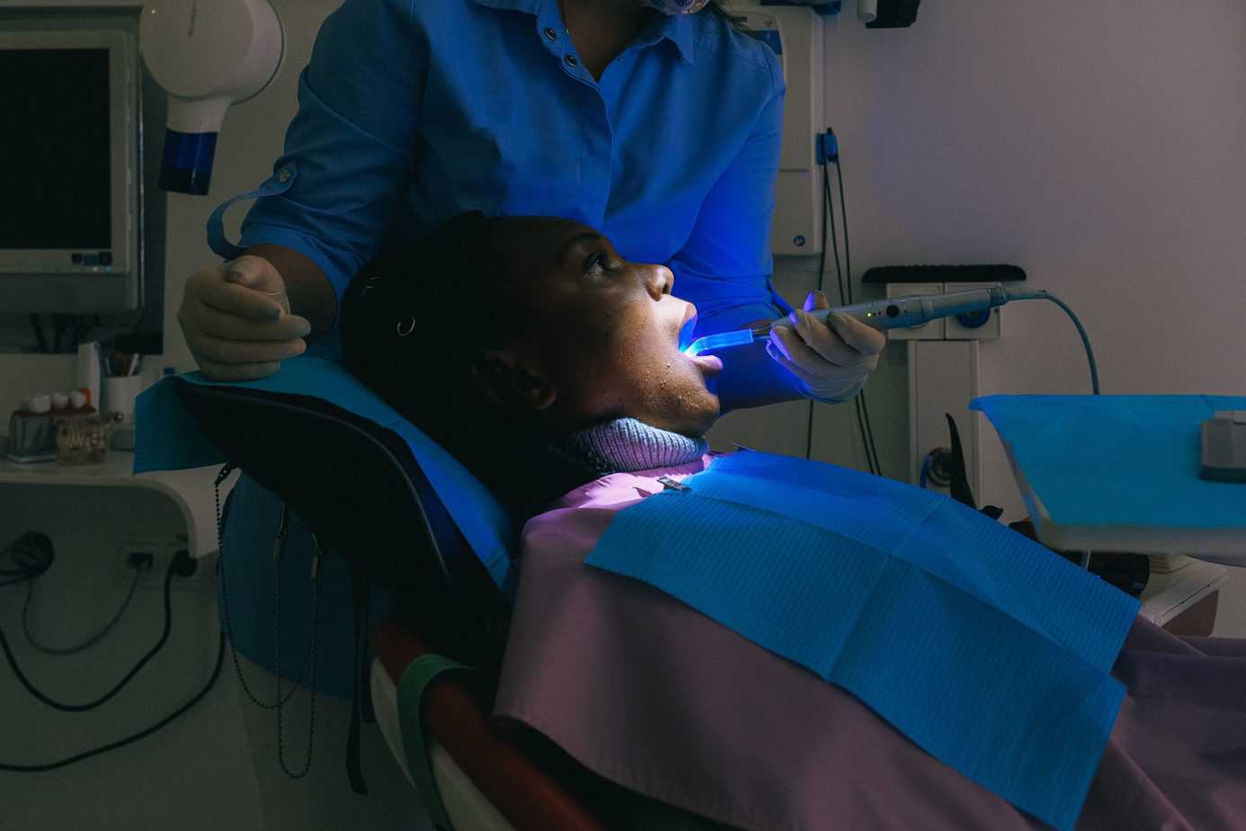 What do regular visits to the dentist provide?